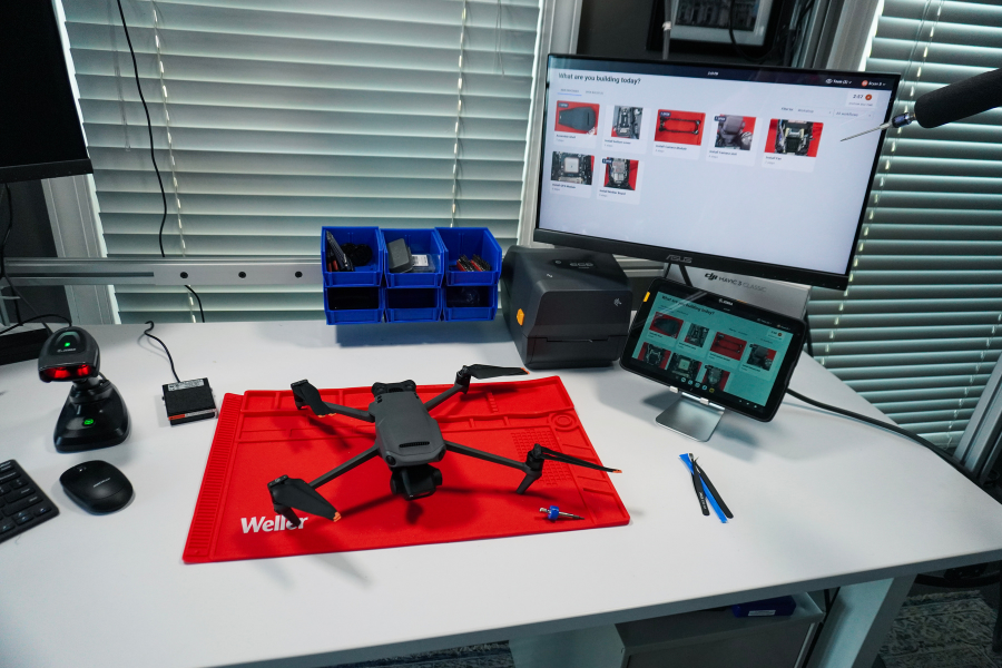 A workbench setup for the teardown and assembly of a drone using Pico MES